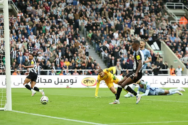 Alexander Isak of Newcastle United scores