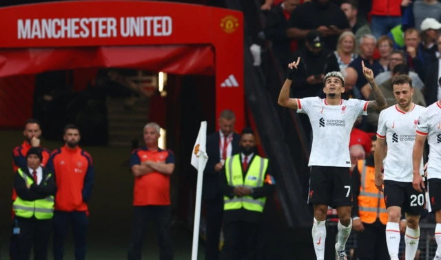 Luis Diaz points to the sky celebrating