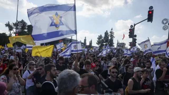 People attend a demonstration calling for the immediate return of hostages held in Gaza, amid the ongoing conflict between Israel and Hamas, outside Prime Minister office in Jerusalem