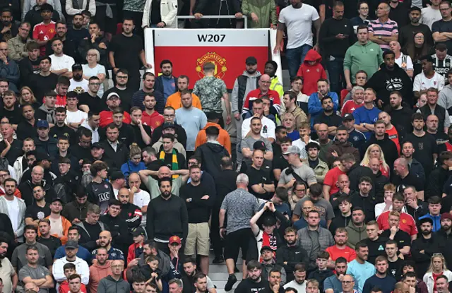 General view inside the stadium, as fans of Manchester United begin to leave