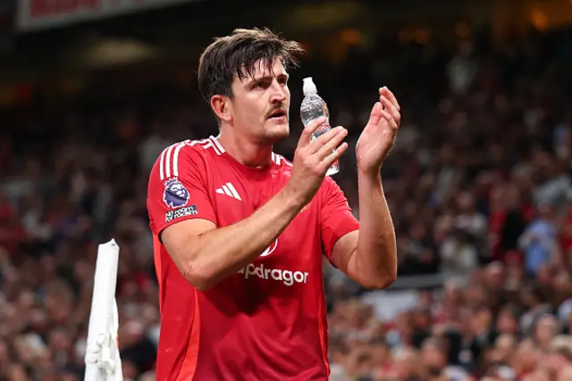 Harry Maguire of Manchester United applauds