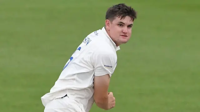 Jack Carson bowling for Sussex at Hove