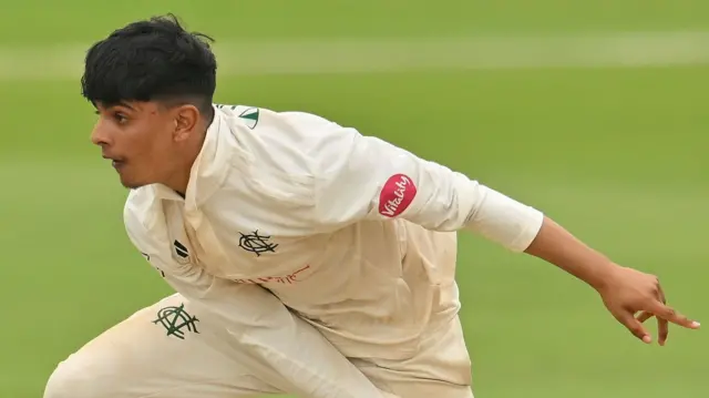 Farhan Ahmed bowling for Notts at Trent Bridge