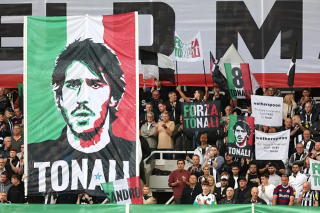 Spectators can be seen holding flags of Sandro Tonali