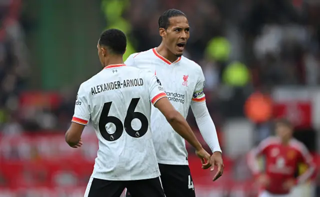 Trent Alexander-Arnold of Liverpool celebrates with teammate Virgil van Dijk,