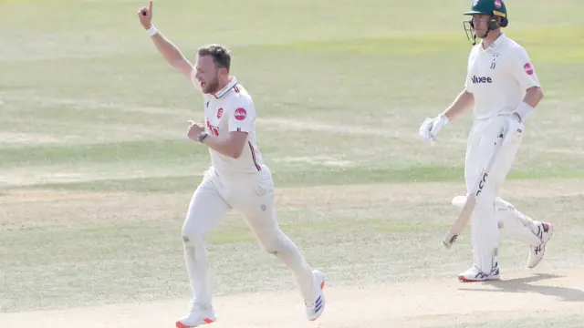 Sam Cook celebrating a wicket