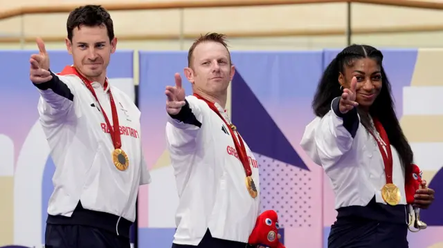 Jaco van Gass, Jody Cundy and Kadeena Cox pose after winning gold medals