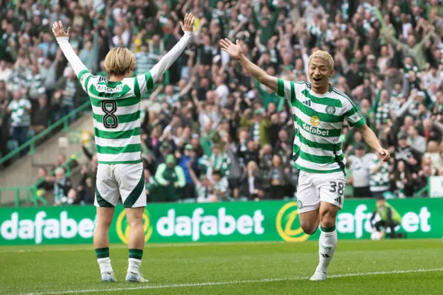 Kyogo and Daizen Maeda celebrate at Celtic Park