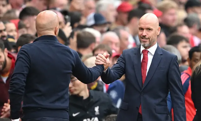 : Erik ten Hag, Manager of Manchester United, interacts with Arne Slot