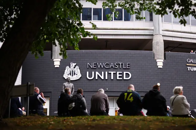 St James Park fans sit outside