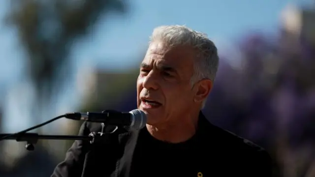 Israeli opposition leader Yair Lapid speaks during an annual Pride and Tolerance March in May 2024