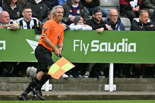 Darren Bond, now acting as assistant referee