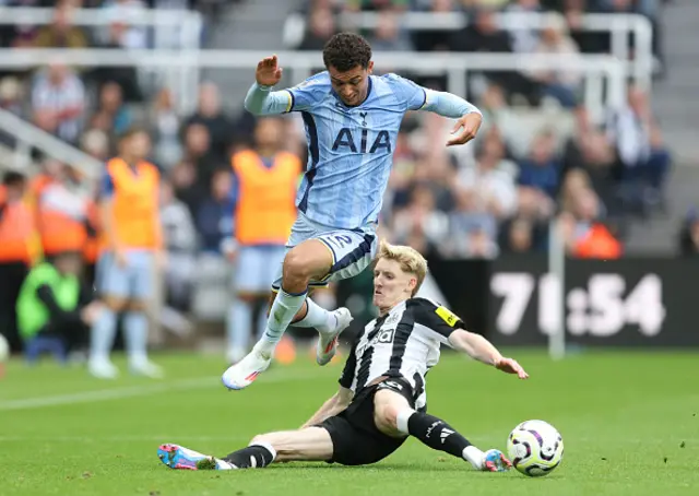 Brennan Johnson of Tottenham Hotspur is tackled by Anthony Gordon