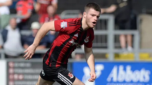 Kieran Offord in action for Crusaders against Carrick Rangers