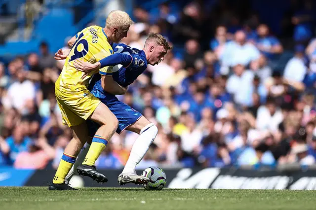 Will Hughes fights for the ball