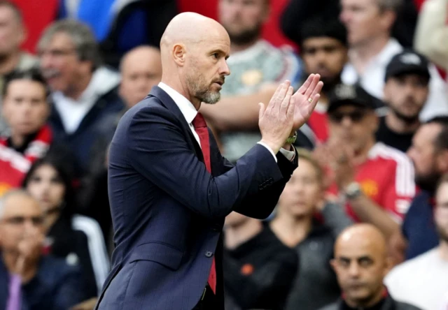 Erik ten Hag applauds the fans