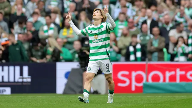 Celtic's Kyogo Furuhashi celebrates scoring their side's second goal of the game during the William Hill Premiership match at Celtic Park, Glasgow.