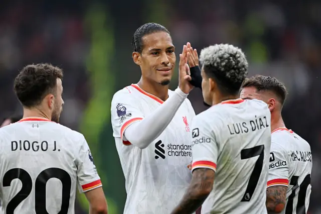 Luis Diaz of Liverpool celebrates with teammate Virgil van Dijk