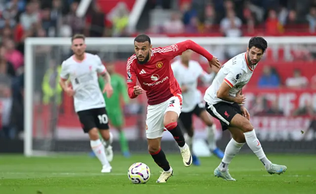 Noussair Mazraoui of Manchester United runs with the ball