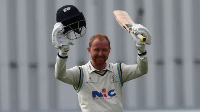 Yorkshire captain Jonny Tattersall raises his bat