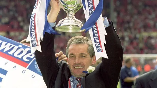 George Burley lifts the Division One play-off final trophy in 2000