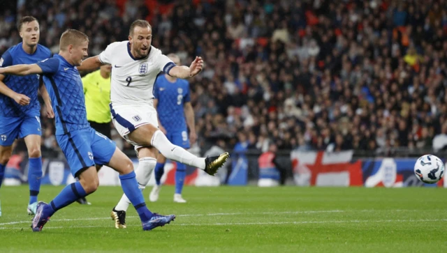 Harry Kane shoots at goal