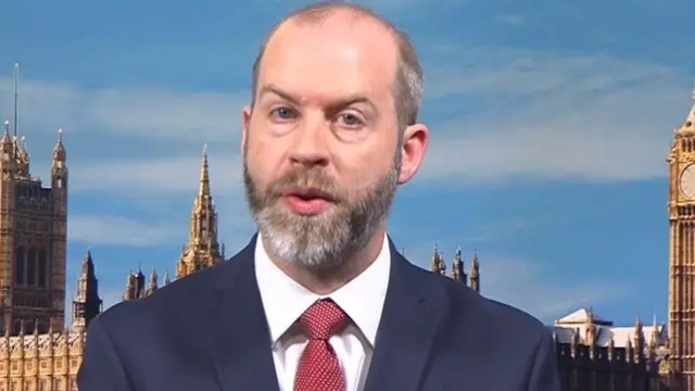 Business Secretary Jonathan Reynolds talking to BBC Breakfast, in front of a Westminster backdrop