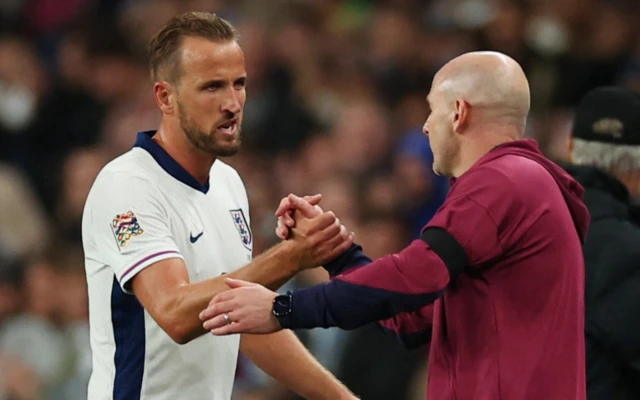 England interim manager Lee Carsley shakes hands with Harry Kane after he was substituted