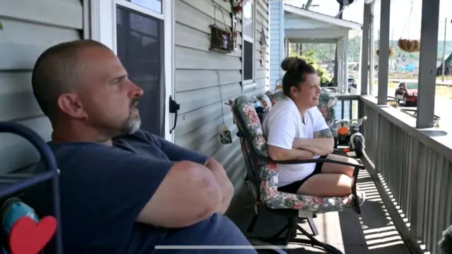 Kelly and Joseph Graham sit on their porch in Johnstown, Pennsylvania