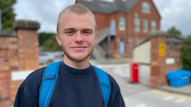 Connor Charlesworth headshot and speaks to the camera