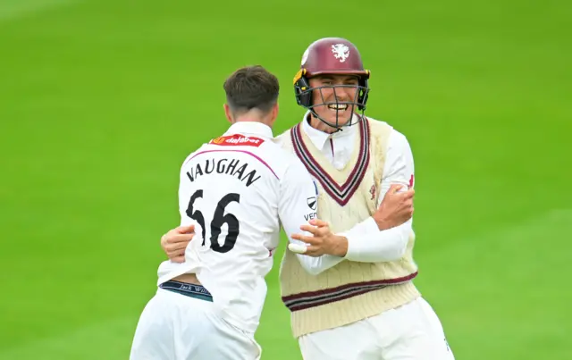 Archie Vaughan celebrates with Somerset team-mate Tom Banton