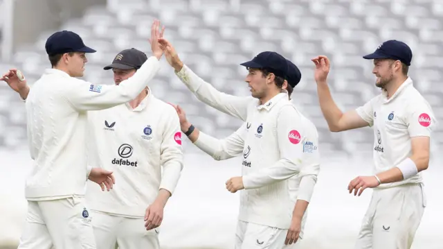 Middlesex celebrate the wicket of Miles Hammond