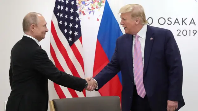 Russian President Vladimir Putin shakes hands with U.S. President Donald Trump during a meeting on the sidelines of the G20 summit in Osaka, Japan, June 28, 2019.