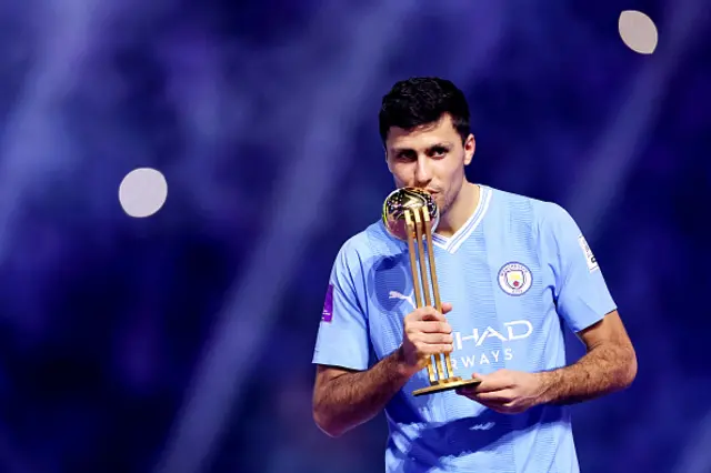 Rodri celebrates with Fifa World Club trophy, 2023