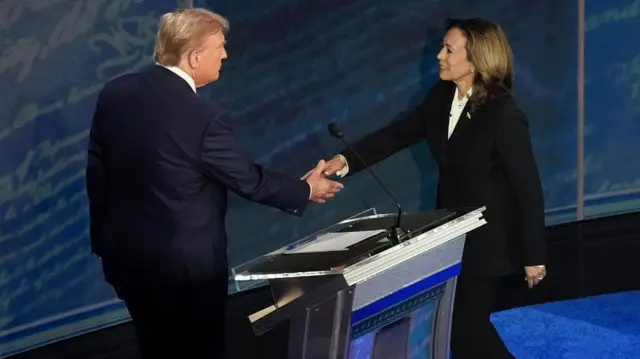 Donald Trump and Kamala Harris shake hands at the start of the debate