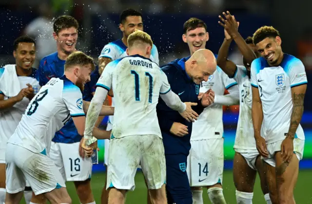 Lee Carsley celebrates with players after the UEFA Under-21 EURO 2023 Final