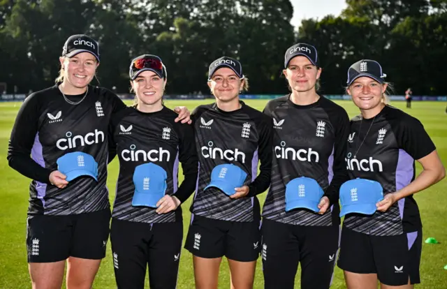 Left to right with their England caps: Hollie Armitage, Mady Villiers, Hannah Baker, Paige Scholfield, Ryana Macdonald-Gay.