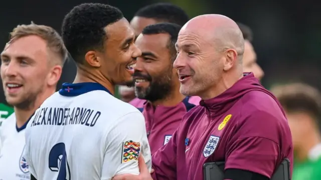 Trent Alexander-Arnold and Lee Carsley smiling