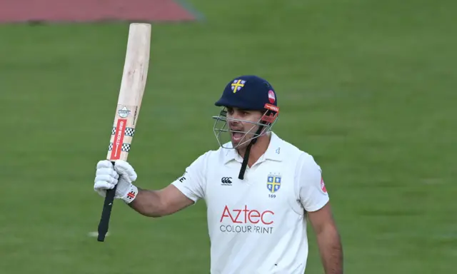 David Bedingham raises his bat