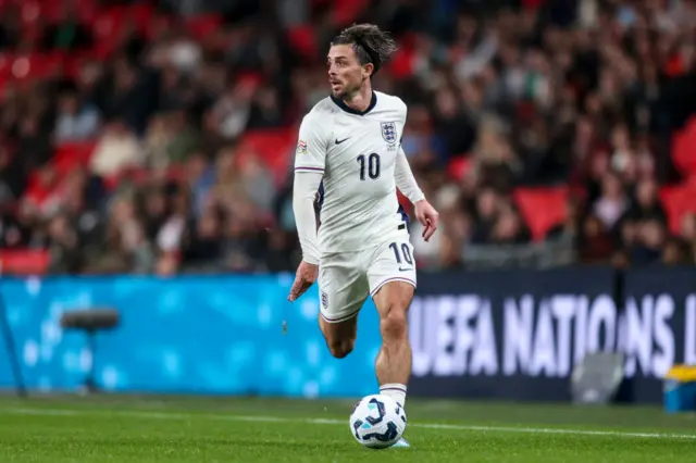 England midfielder Jack Grealish running with the ball