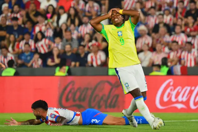 Brazil's Endrick with his head in his hands during their defeat to Paraguay