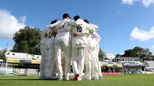 Essex players huddle