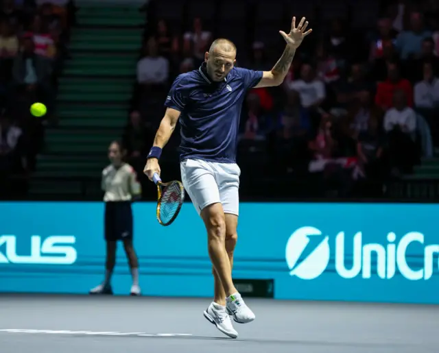 Dan Evans hits a graceful backhand