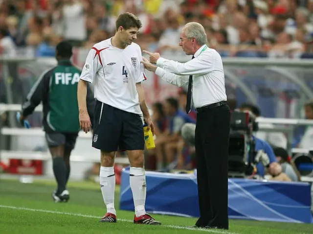 Sven Goran Eriksson talking with Steven Gerrard on the sideline of an England game