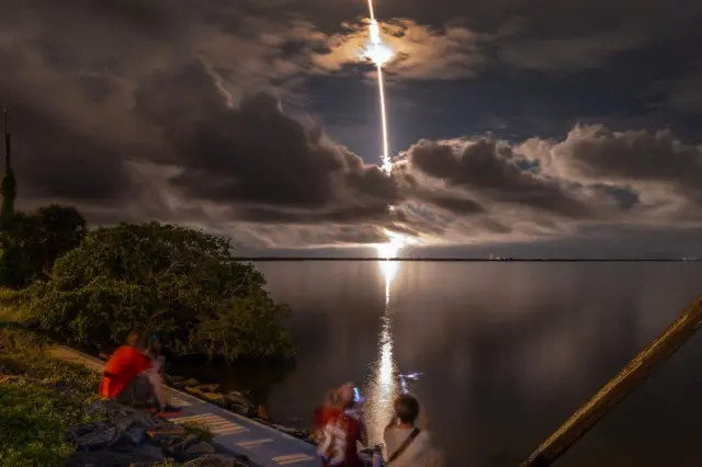 Lift-off on Tuesday, as seen from the shore in Florida