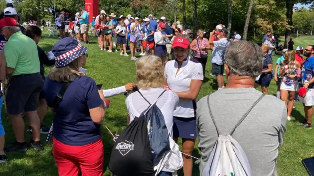 Lexi Thompson signs autographs