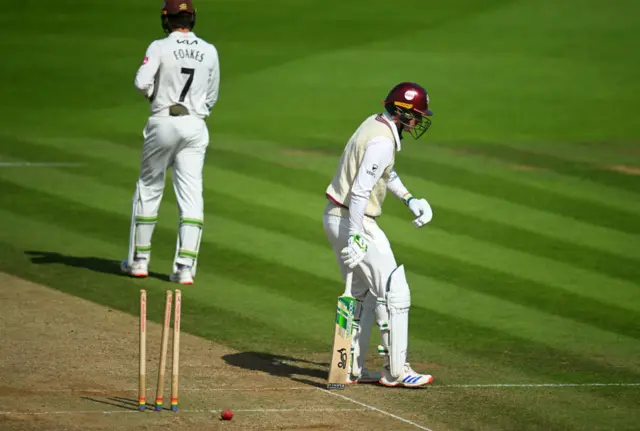 Tom Banton hobbles off after being bowled