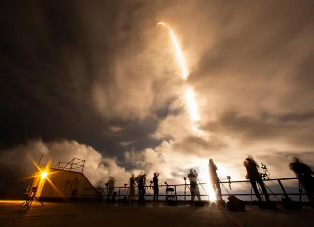 The SpaceX Falcon 9 rocket lifts off on Tuesday, taking the crew to space