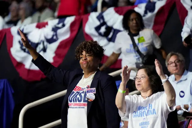 Attendees dance ahead of Harris speaking