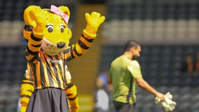 Hull City mascot Amber waves to the crowd